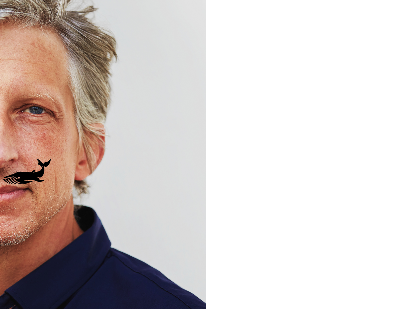 William Wahl mit einem Walsymbol auf der linken Oberlippe