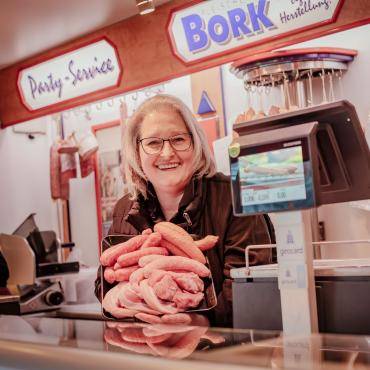 Wochenmarkt Marktstand Fleischerei Bork Portrait