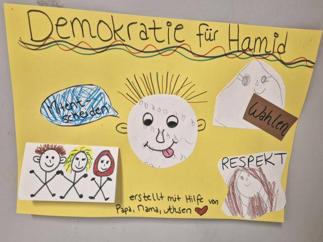 Demokratie für Hamid steht auf dem Poster